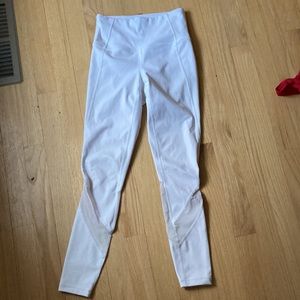 Athleta leggings in white with sheer trim at calf
